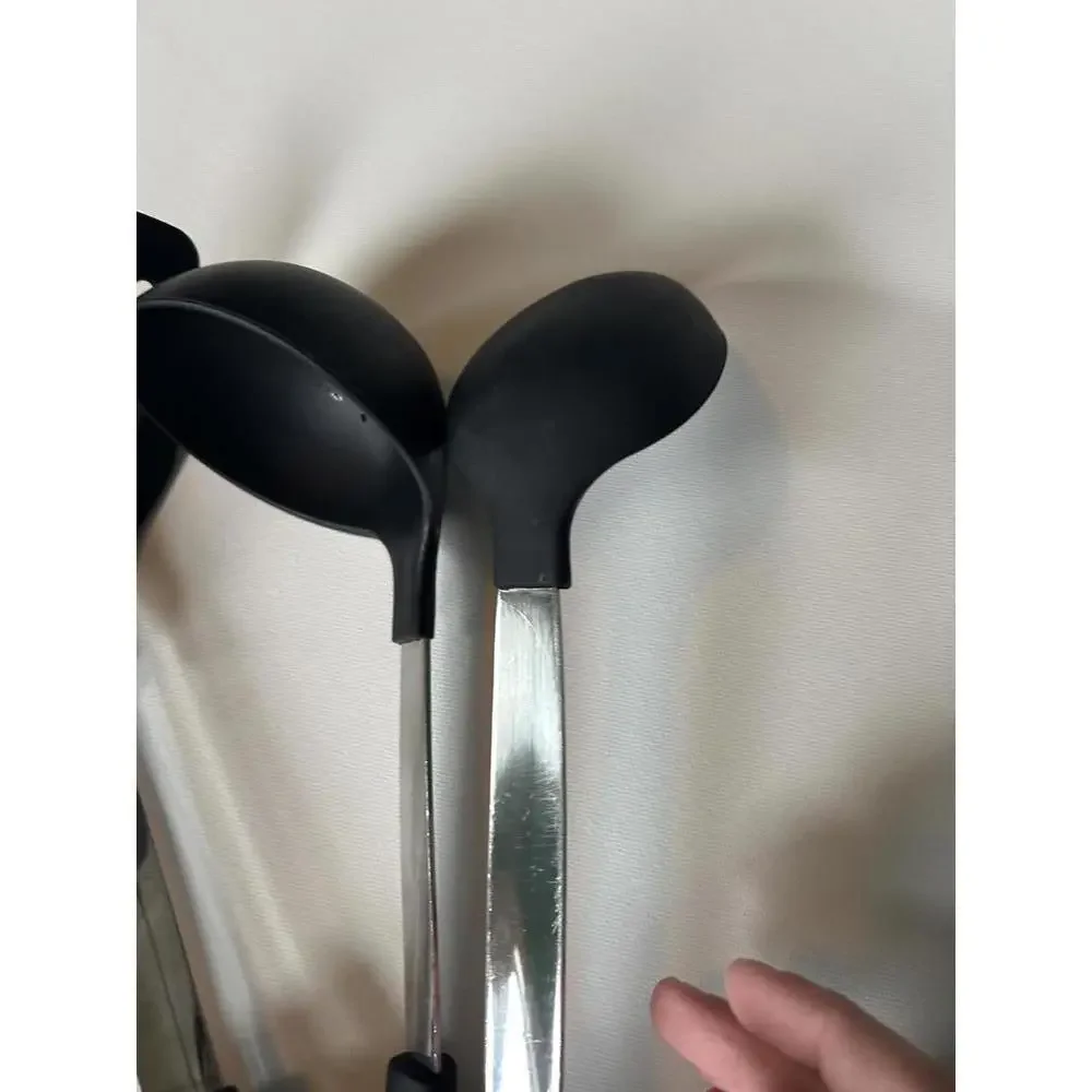 6 piece set of black silicone kitchen utensils with stainless steel handles